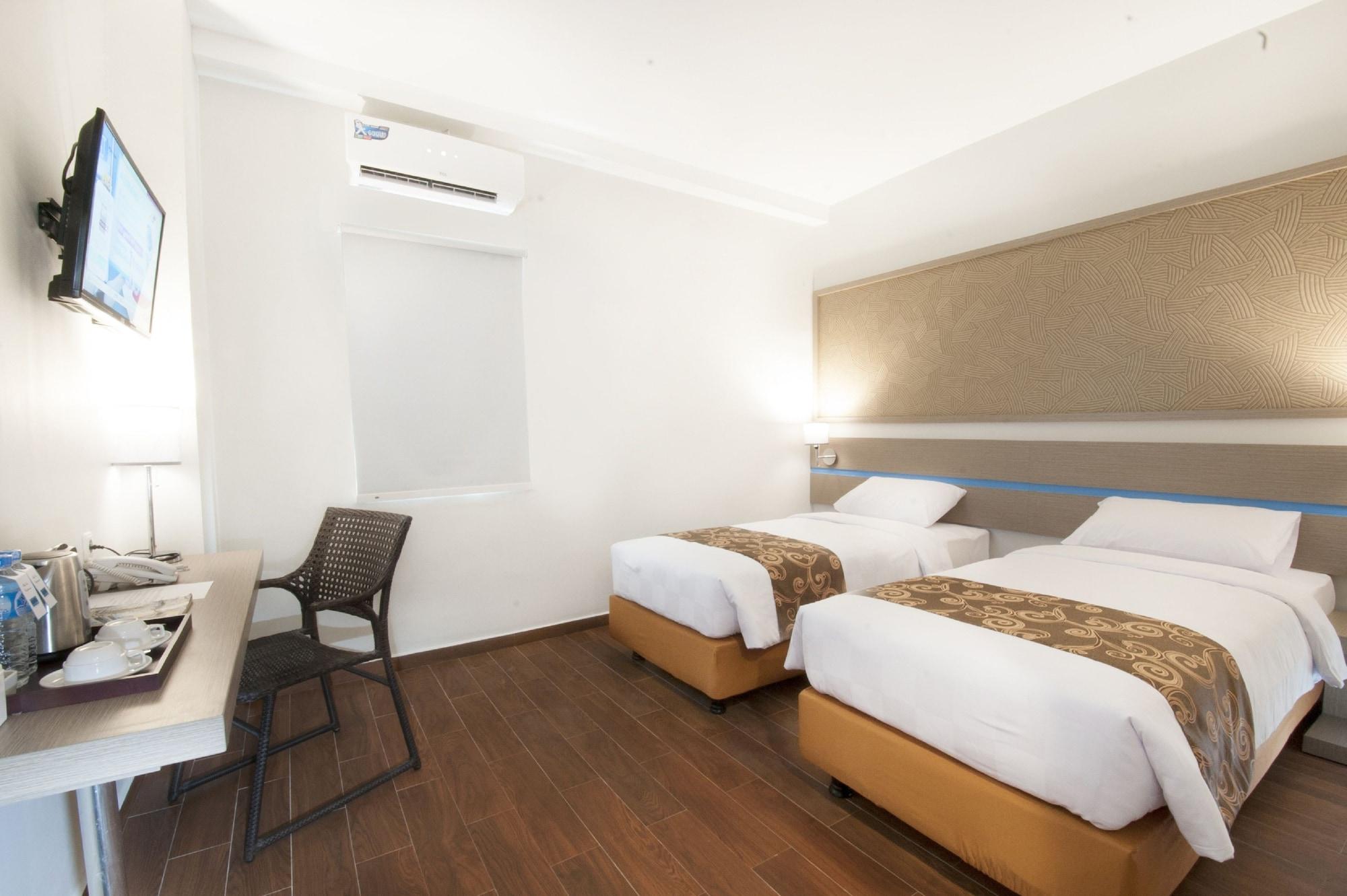Genio Hotel Manado Exterior photo