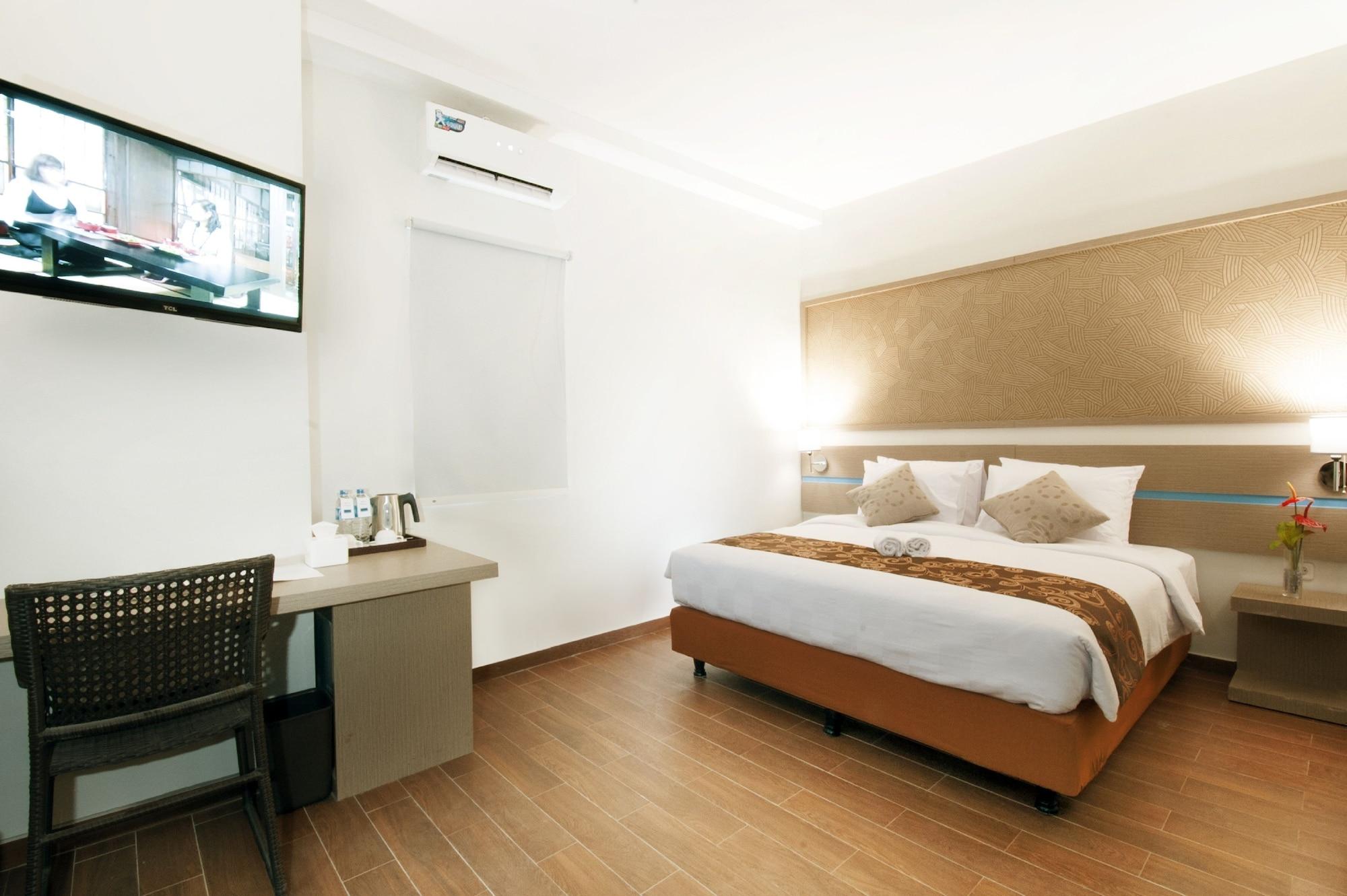 Genio Hotel Manado Exterior photo